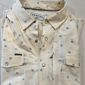 Men’s poncho short sleeve button downn snap front. Performance meets western.